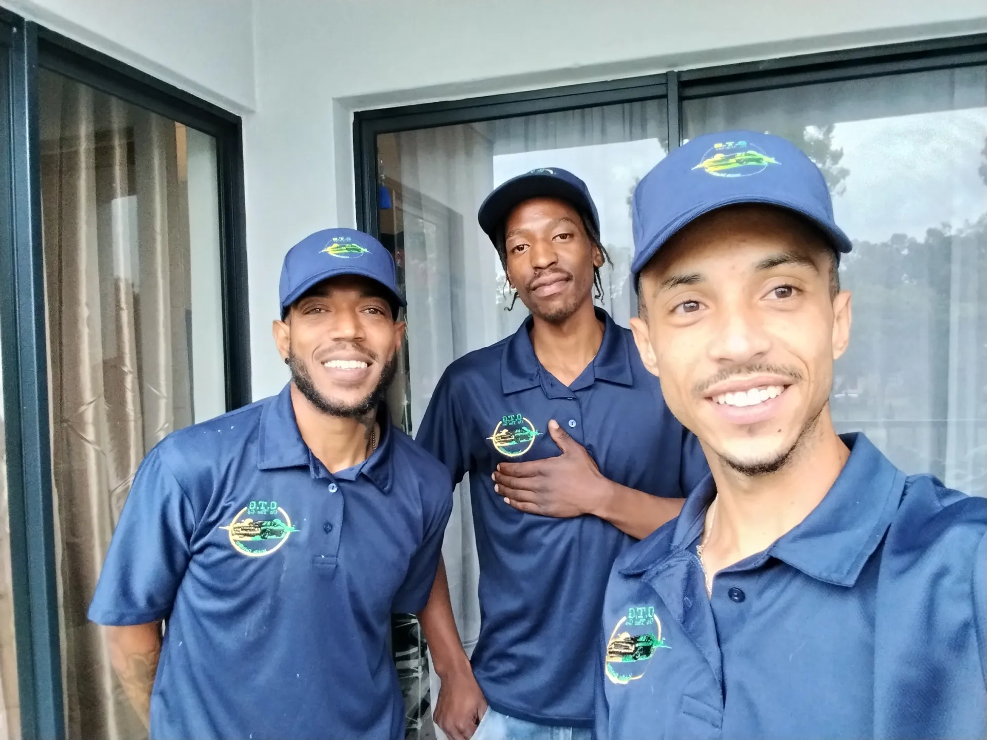 The OTG Mobile Detailing team in branded uniform